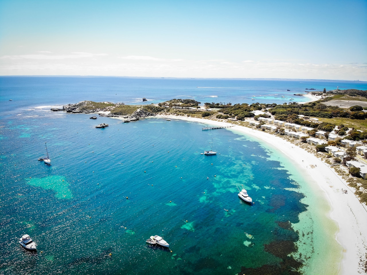 Boat dock over turquoise Rottnest Island water